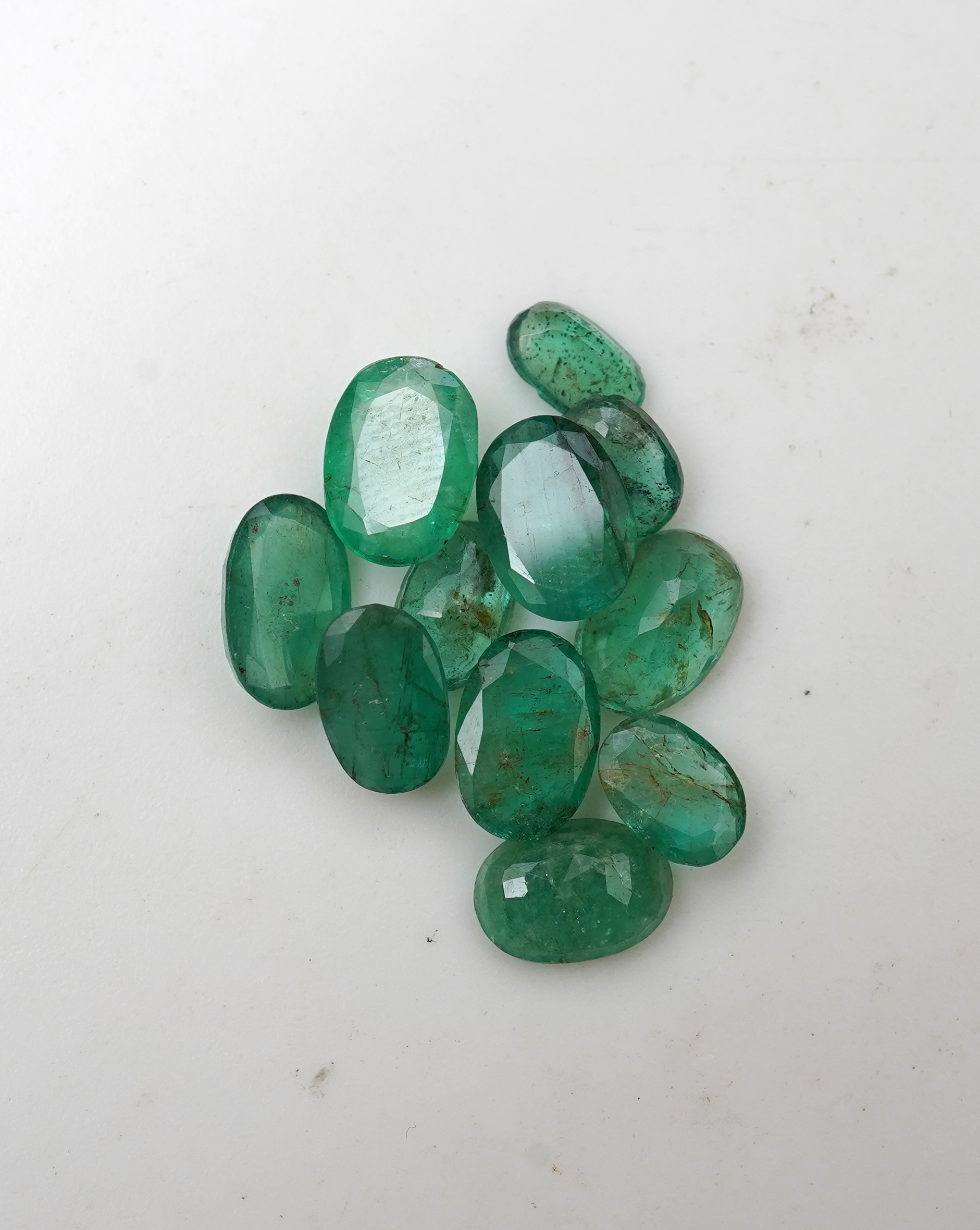 A collection of loose emeralds